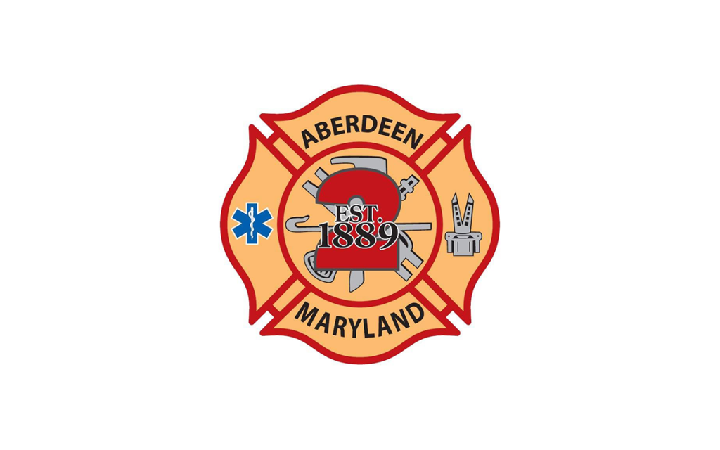 Aberdeen Maryland Fire Department logo featuring a red Maltese cross, a fire helmet marked “EST. 1889,” firefighting tools, and a blue emergency medical symbol on a light background.